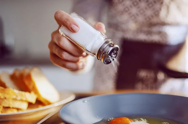 making a healthy choice of food salt